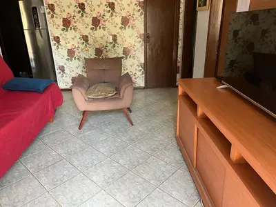 Uma televisão e/ou sistema de entretenimento em Casa Morada da Praia
