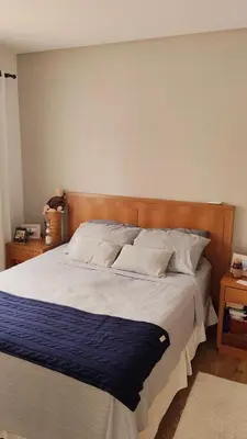 Uma cama ou camas num quarto em Lindissima casa na praia! Aqui você vai se sentir em casa!
