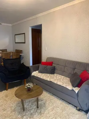 Uma área de estar em Apartamento Impecável, próximo ao mar!