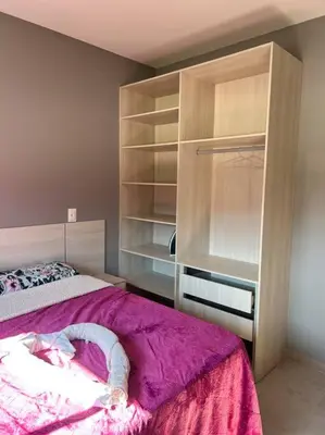 Uma cama ou camas num quarto em Apartamento na praia de palmas