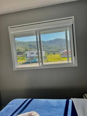 Uma cama ou camas num quarto em Apartamento na praia de palmas