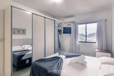 Uma cama ou camas num quarto em Apto 3Q c/ churrasqueira a 170m da Praia TSF1302