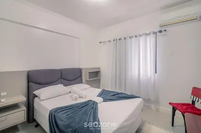 Uma cama ou camas num quarto em Apto 3Q c/ churrasqueira a 170m da Praia TSF1302