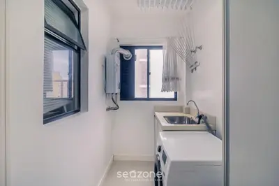 Uma televisão e/ou sistema de entretenimento em Apto 3Q c/ churrasqueira a 170m da Praia TSF1302