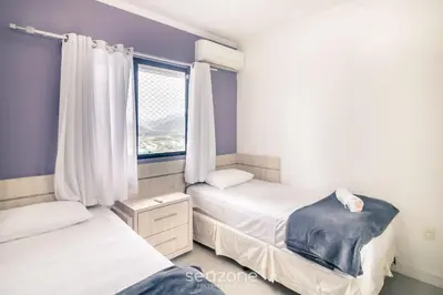Uma cama ou camas num quarto em Apto 3Q c/ churrasqueira a 170m da Praia TSF1302
