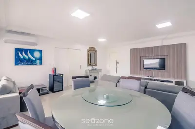 Uma televisão e/ou sistema de entretenimento em Apto 3Q c/ churrasqueira a 170m da Praia TSF1302