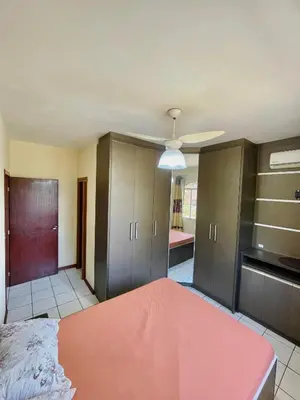 Uma cama ou camas num quarto em Casa de Ferias Em Governador Celso Ramos