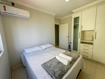 Uma cama ou camas num quarto em Apartamento Vista mar