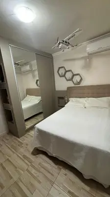 Uma cama ou camas num quarto em Casa de praia em meio a natureza