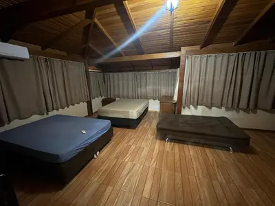 Uma cama ou camas num quarto em Casa de praia em meio a natureza