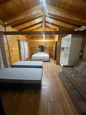 Uma cama ou camas num quarto em Casa de praia em meio a natureza