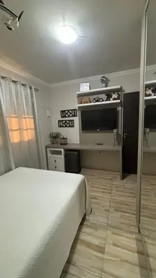 Uma cama ou camas num quarto em Casa de praia em meio a natureza