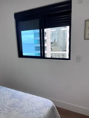 Uma cama ou camas num quarto em Apartamento, quadra mar