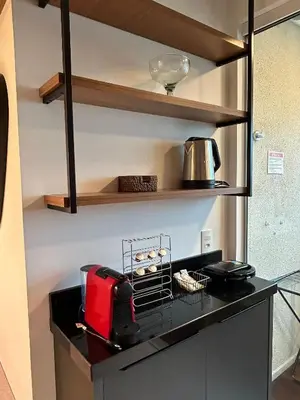 A cozinha ou kitchenette de Apto 3 dormitórios Sky Bridge Residence Itapema