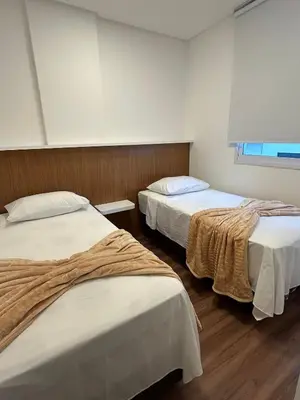 Uma cama ou camas num quarto em Apto 3 dormitórios Sky Bridge Residence Itapema