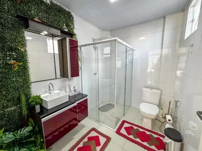 Uma casa de banho em cobertura vista mar