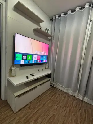 Uma televisão e/ou sistema de entretenimento em Apartamento Vagner