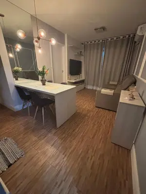 Uma televisão e/ou sistema de entretenimento em Apartamento Vagner