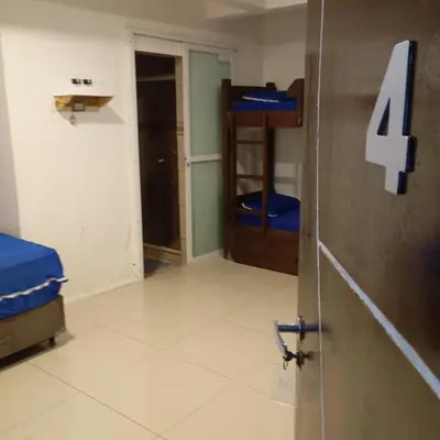 Uma cama ou camas num quarto em Pousada Morro dó Macaco ARTE