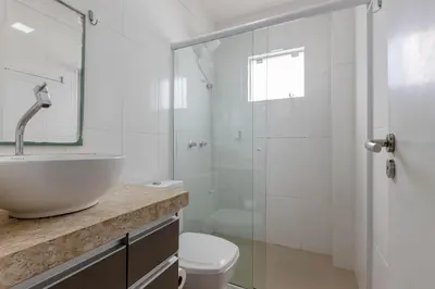Uma casa de banho em Apartamento a poucos metros da praia de Bombinhas