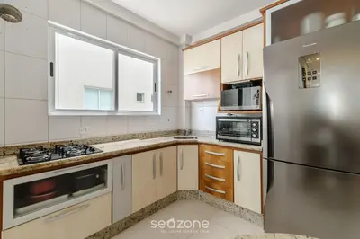 A cozinha ou kitchenette de Apto vista mar c/ churrasq. a 50m da Praia ATT0602