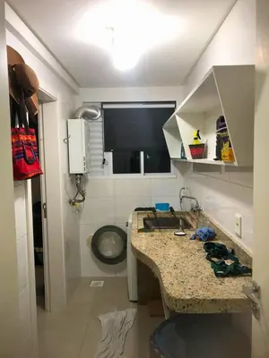 A cozinha ou kitchenette de Apartamento Meia Praia