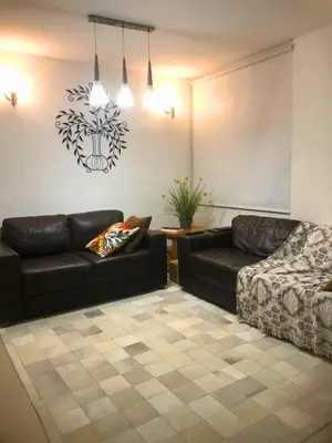 Uma área de estar em Apartamento Meia Praia