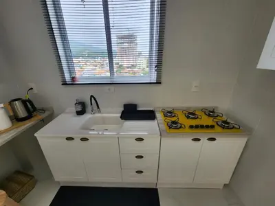 A cozinha ou kitchenette de Residencial Imperador Vista Mar