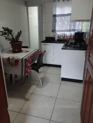 A cozinha ou kitchenette de Casa 500 metros praia do centro