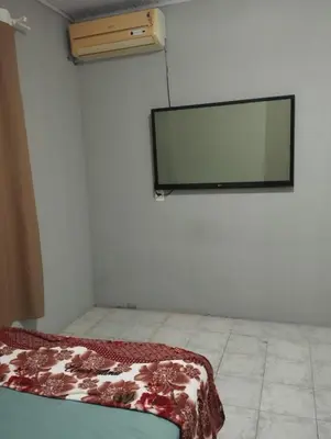 Uma cama ou camas num quarto em Casa 500 metros praia do centro