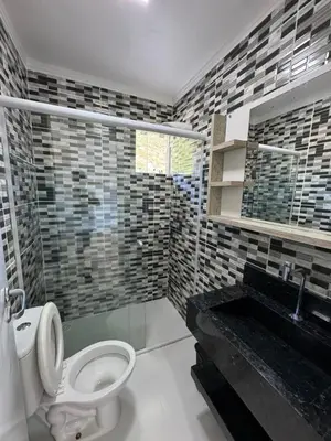 Uma casa de banho em Hospedaria marli