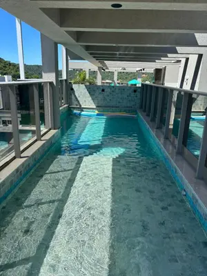 A piscina em ou perto de Apto com piscina aquecida perto do mar
