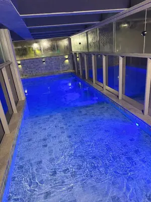 A piscina em ou perto de Elegance Apartamentos 1 quarto para 4 pessoas em Bombinhas