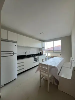 A cozinha ou kitchenette de Pé na areia Apto Bombas