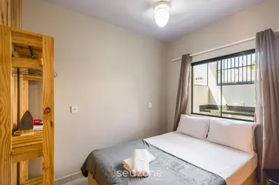 Uma cama ou camas num quarto em RUC - Casas a 270m da Praia do Canto Grande