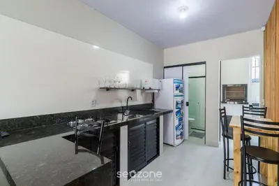 A cozinha ou kitchenette de RUC - Casas a 270m da Praia do Canto Grande