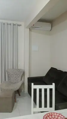 Uma área de estar em Casa em Bombas - Bombinhas