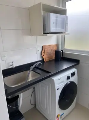 A cozinha ou kitchenette de Apto 500m praia de Palmas