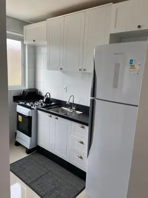 A cozinha ou kitchenette de Apto 500m praia de Palmas