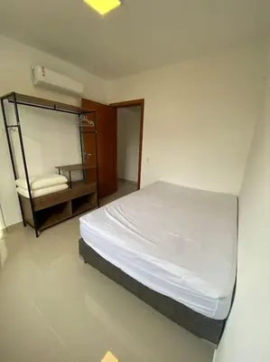 Uma cama ou camas num quarto em Apto 500m praia de Palmas