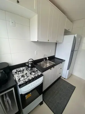 A cozinha ou kitchenette de Apto 500m praia de Palmas
