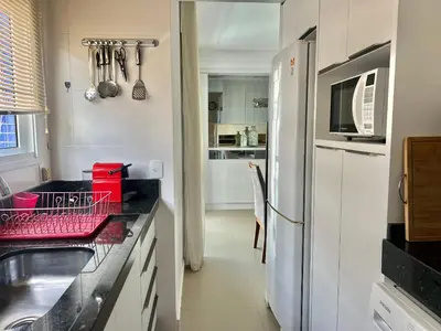 A cozinha ou kitchenette de Conforto! Apto com piscina no condomínio! PJ03I