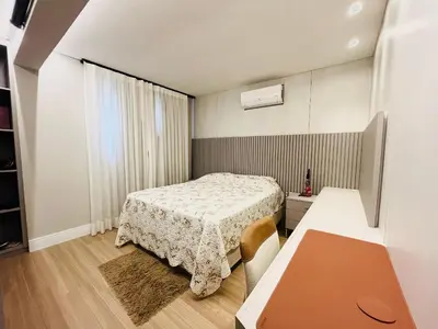 Uma cama ou camas num quarto em Cobertura na Praia de Palmas, a apenas 300 metros do mar.