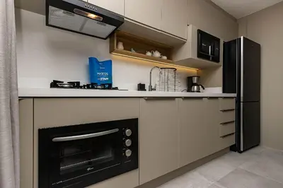 A planta de Porto Madero 105 – Apartamento Moderno em Condomínio com Piscina e Academia no Rooftop no Centro de Bombinhas.