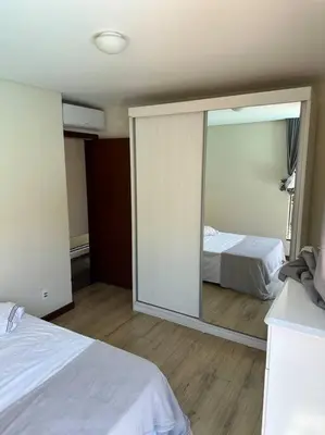 Uma cama ou camas num quarto em Casa refúgio praia do Estaleiro