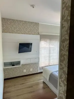 Uma cama ou camas num quarto em Casa refúgio praia do Estaleiro