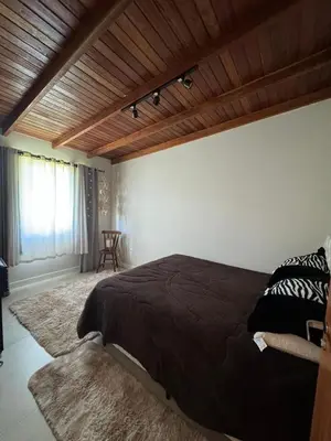 Uma cama ou camas num quarto em Casa com 3 quartos e piscina no Mariscal