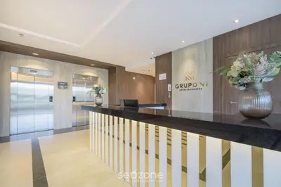 A cozinha ou kitchenette de MHF III - Apts Variados a 280m da Praia em Itapema