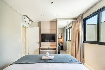 Uma cama ou camas num quarto em MHF III - Apts Variados a 280m da Praia em Itapema