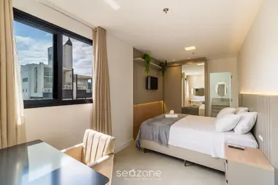 Uma cama ou camas num quarto em MHF III - Apts Variados a 280m da Praia em Itapema